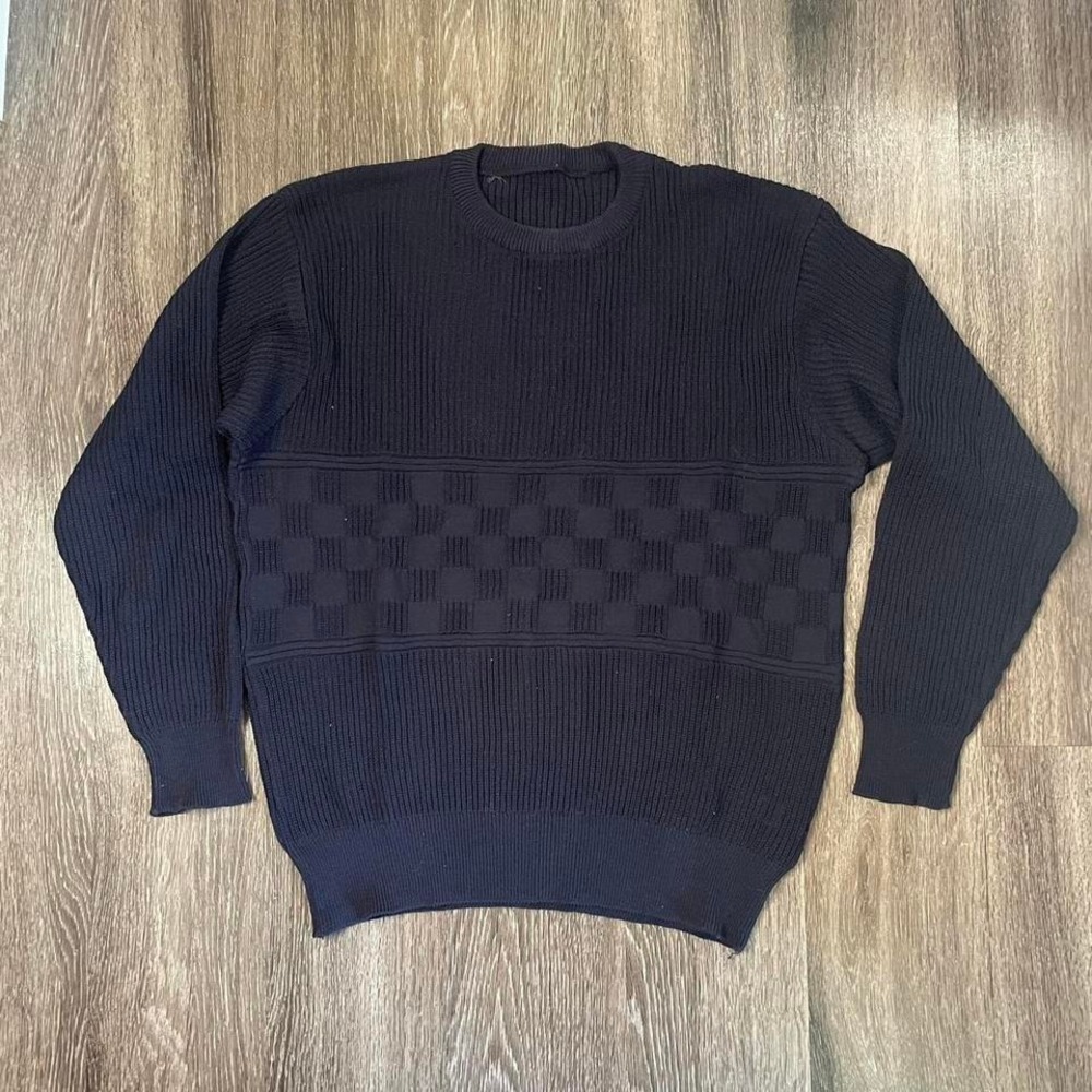 Vintage 1990s Fila navy checkered sweater with ribbed details.